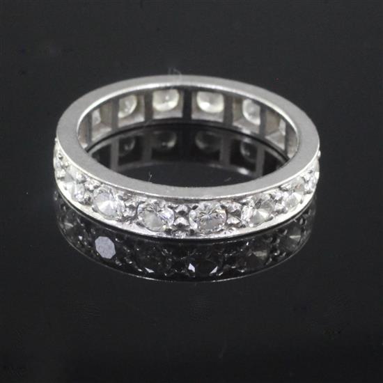 A platinum and diamond full eternity ring, size M.